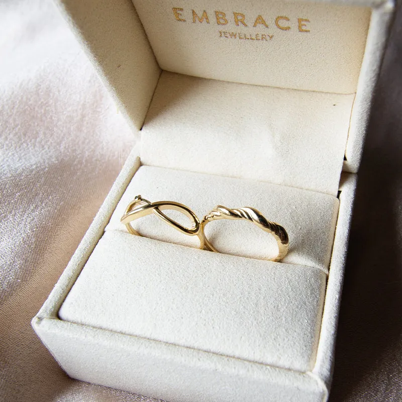 Infinity Ring with Green Diamond